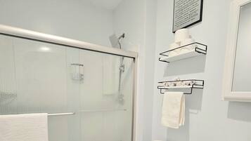 Hair dryer, towels, soap, toilet paper