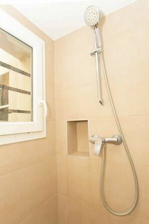 Hair dryer, towels, soap, shampoo