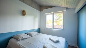 3 dormitorios, tabla de planchar con plancha, wifi gratis y ropa de cama