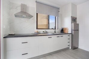 Fridge, microwave, oven, stovetop