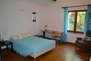 A bedroom with a bed, desk, chair, and window with curtains. - Mas with Private Pool and Complimentary Wellness Package (Saint-Michel-de-Dèze)