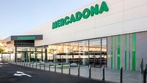 A modern Mercadona store with large glass windows and a prominent green sign.