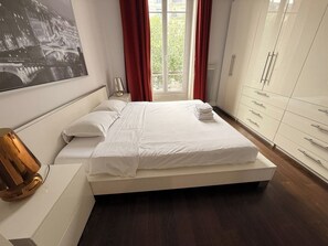 1 bedroom, desk, iron/ironing board, travel cot