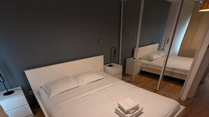 2 bedrooms, desk, iron/ironing board, travel crib