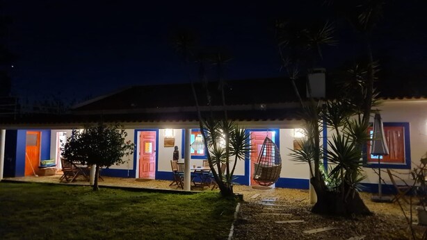 A house with multiple doors, a visible front porch, and a small garden area. - Cottage 'Casa 4' with Shared Pool, Private Terrace and Wi-Fi (Ribeira da Azenha)