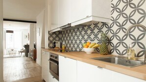 Private kitchen - BnBNook - Cozy 1BR by Louvre, Opera, and Le Marais (Paris)