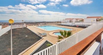 Vacation 'Calida Vivienda Accesible' with Shared Pool, Private Terrace and Wi-Fi