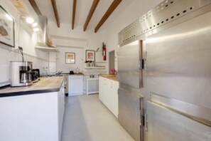 Fridge, stovetop, electric kettle, toaster