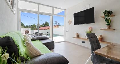 Maison de vacances 'Illa De Buda' avec vue sur les montagnes, Wi-Fi et climatisation