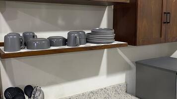 Full-size fridge, microwave, stovetop, coffee/tea maker