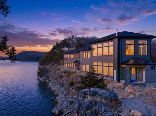 Expansive Lakefront Estate with Private Pool, Dock, 2 Slips, & Movie Theater at 43mm