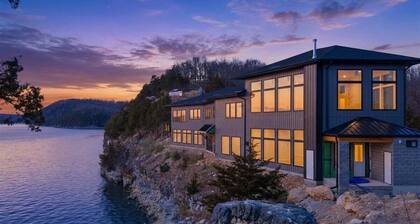Expansive Lakefront Estate with Private Pool, Dock, 2 Slips, & Movie Theater at 43mm