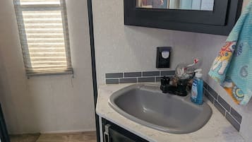 Shower, towels, toilet paper