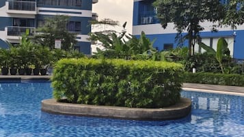 2 albercas al aire libre