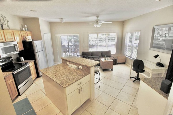 Down the hall is the open room, where you can work, relax and cook together!