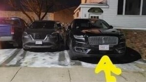 A residential driveway with three parked vehicles and a yellow arrow pointing upwards. - Charming 2-bedroom condo in delightful Chelsea with WiFi, AC (Chelsea)