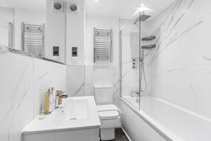 Hair dryer, towels, soap, toilet paper