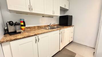 Fridge, microwave, coffee/tea maker, electric kettle