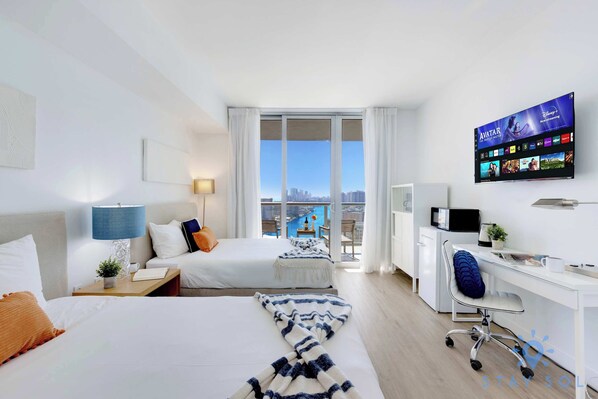 Desk, iron/ironing board, travel crib, WiFi