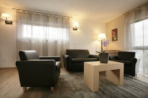 Apartamento clásico | Zona de estar