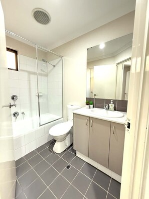 Shower, hair dryer - 38 Suburban Family Retreat 3BR (Pearsall)