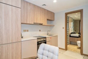 Studio, Balcony, City View | Private kitchen | Espresso maker, electric kettle - Live in Luxury Studio at Urban Oasis Residences (Dubai)