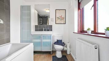 Shower, hair dryer, towels, shampoo