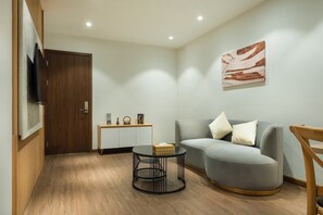 Deluxe Apartment | Living room | 42-inch LED TV with cable channels - Hanoi Bliss Nam Ngu (Hanoi)