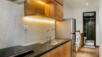 Appartamento Deluxe | Cucina privata | Frigorifero