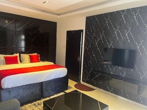 Family Suite, Balcony, City View | Desk, laptop workspace, free WiFi