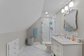 Shower, hair dryer, towels, soap