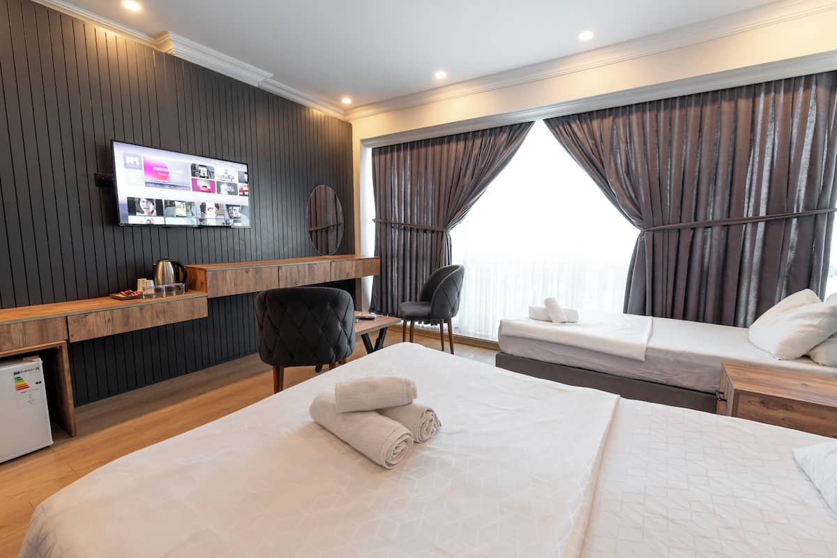 Classic Triple Room, City View | Frette Italian sheets, premium bedding, memory-foam beds, in-room safe