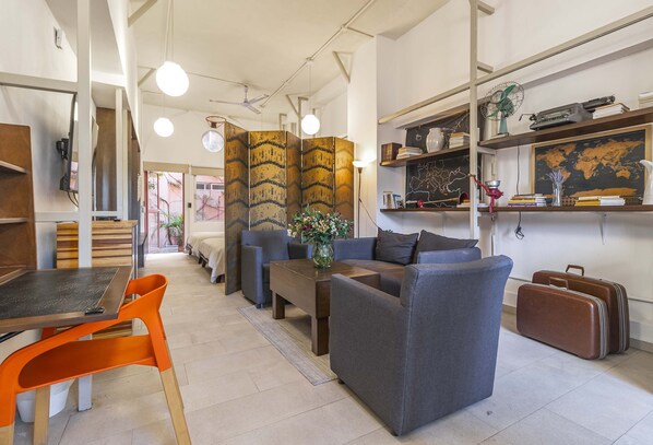 1 bedroom, desk, iron/ironing board, travel crib