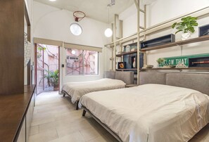 1 bedroom, desk, iron/ironing board, travel crib