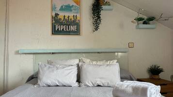 1 slaapkamer, een strijkplank/strijkijzer, beddengoed