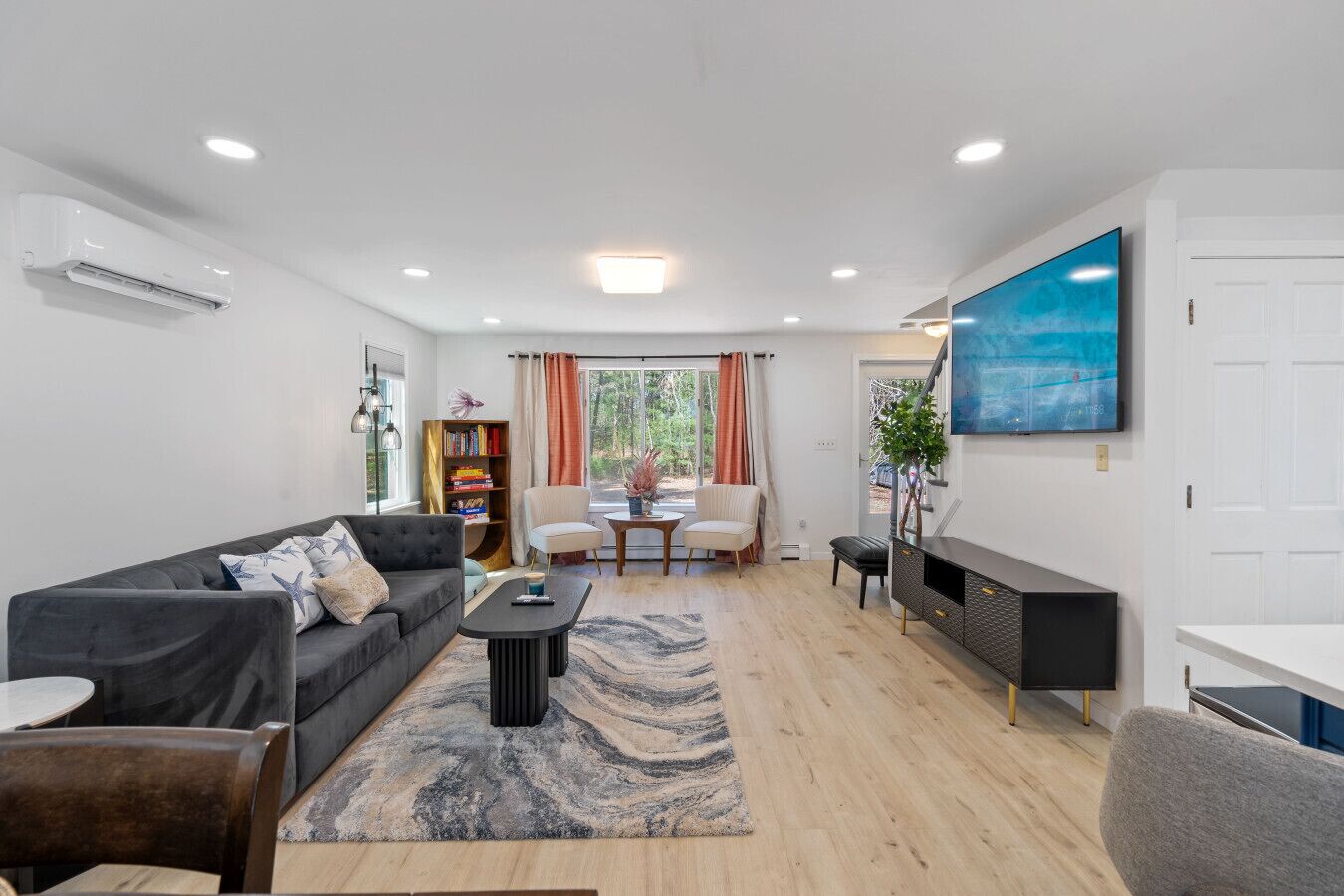 Smart TV, fireplace, foosball, books