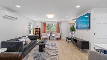 Smart TV, fireplace, foosball, books