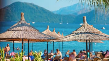 On the beach, free beach shuttle, free beach cabanas, sun-loungers
