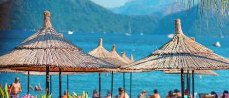 On the beach, free beach shuttle, free beach cabanas, sun-loungers