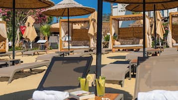 On the beach, free beach shuttle, free beach cabanas, sun loungers