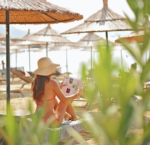 En la playa y traslado desde/hacia la playa gratis