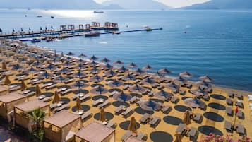 Na praia, serviço de traslado de/para a praia grátis