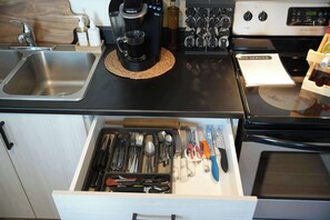 Fridge, microwave, stovetop, coffee/tea maker