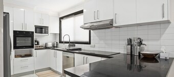 Coastal Blue is a large 5 bedroom holiday home on the NSW South Coast located in Windang.