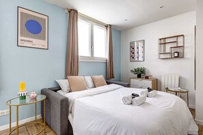 1 habitación, tabla de planchar con plancha, cuna de viaje y wifi 