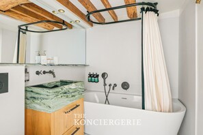 Shower, free toiletries, hair dryer, towels