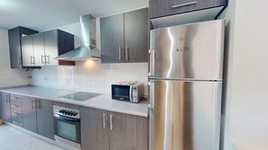 Fridge, microwave, oven, electric kettle
