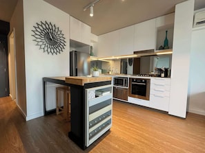 Fridge, microwave, dishwasher, coffee/tea maker