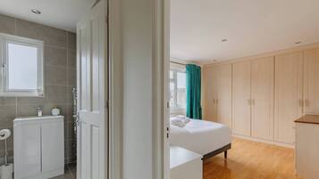 Shower, hair dryer, shampoo
