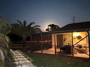 Terrace/patio - Spacious 4BR Lakefront Getaway – Heated Pool, Hot Tub  Near Everything! (Port St. Lucie)